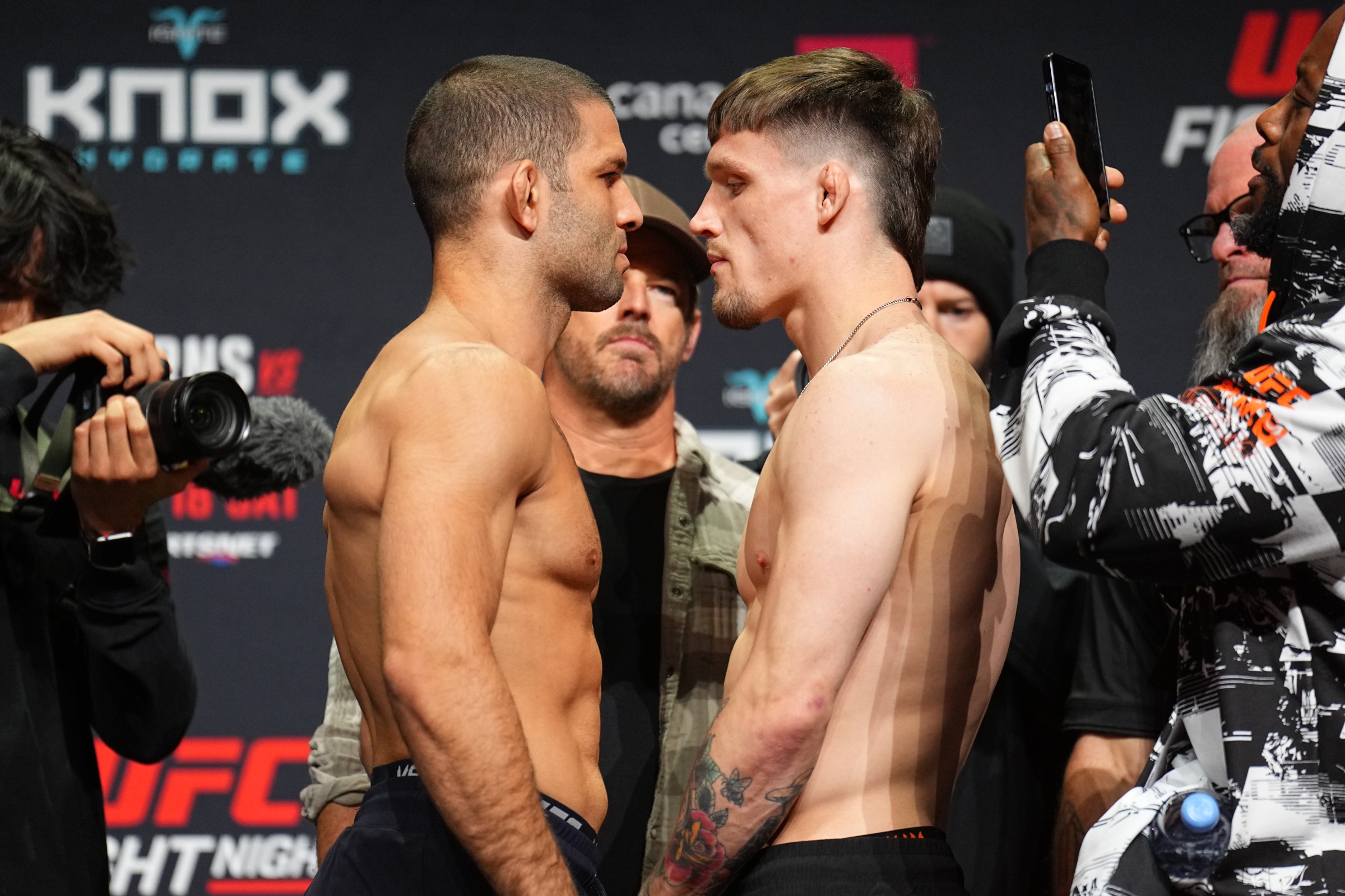 WINNIPEG, MANITOBA - APRIL 17: (L-R) Opponents Thiago Moises of Brazil and Gauge Young face off during the UFC Fight Night ceremonial weigh-in at Canada Life Centre on April 17, 2026 in Winnipeg, Manitoba. (Photo by Chris Unger/Zuffa LLC)