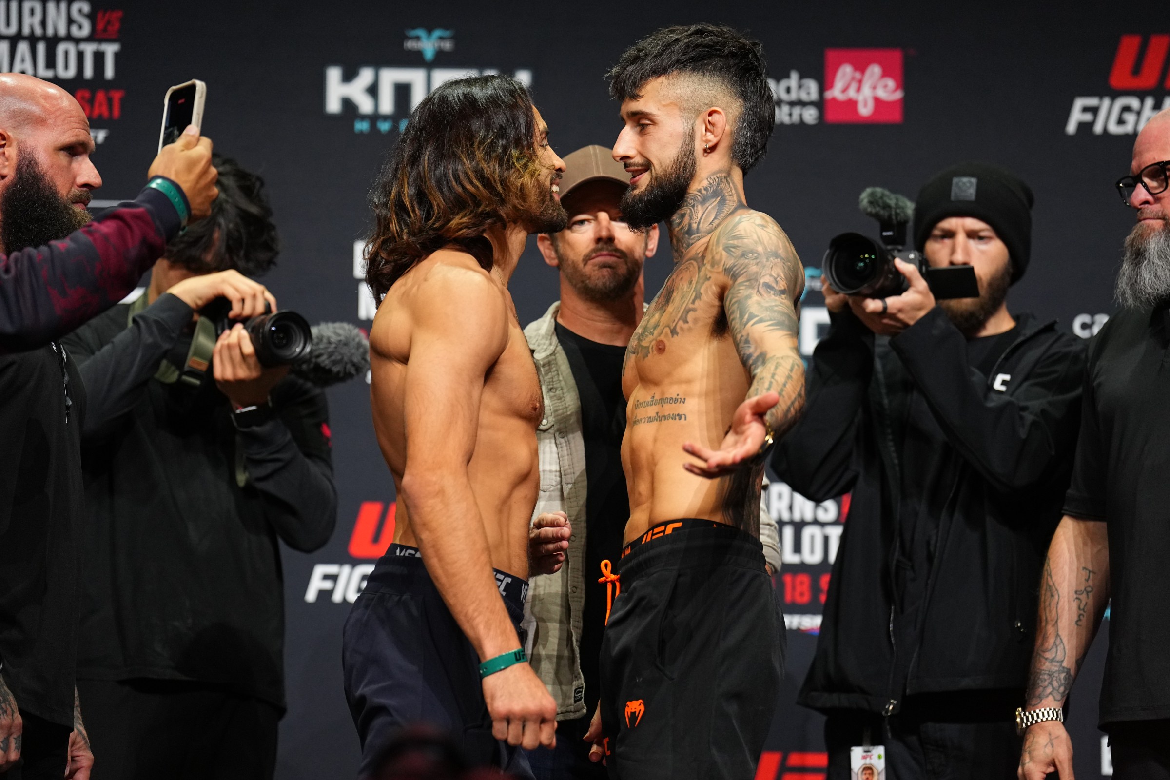 WINNIPEG, MANITOBA - APRIL 17: (L-R) Opponents Kyler Phillips and Charles Jourdain of Canada face off during the UFC Fight Night ceremonial weigh-in at Canada Life Centre on April 17, 2026 in Winnipeg, Manitoba. (Photo by Chris Unger/Zuffa LLC)