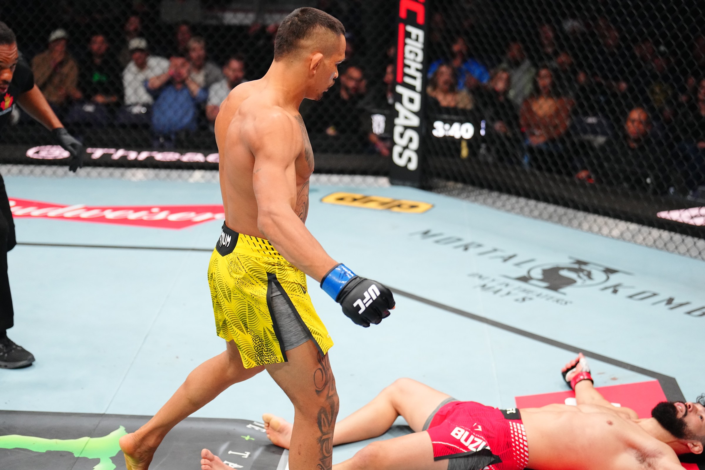 WINNIPEG, MANITOBA - APRIL 18: (L-R) Marcio Barbosa of Brazil knocks out Dennis Buzukja in a featherweight fight during the UFC Fight Night event at Canada Life Centre on April 18, 2026 in Winnipeg, Manitoba. (Photo by Chris Unger/Zuffa LLC)