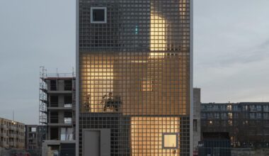 glass block facade wraps studioninedots’ stacked box residence in amsterdam