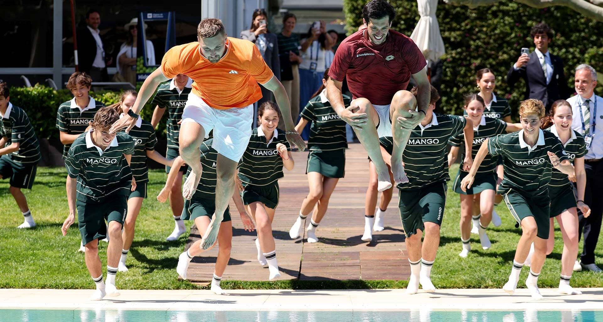 Lloyd Glasspool and Julian Cash celebrate winning Barcelona by jumping in the pool, an annual tradition at the ATP 500 event.