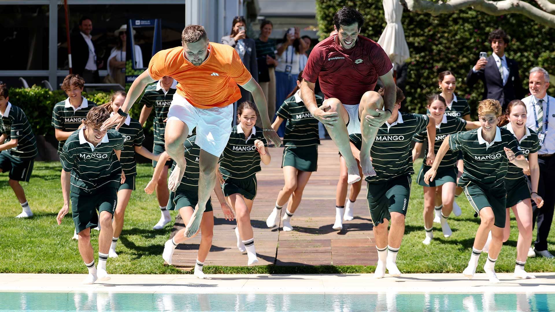 Lloyd Glasspool and Julian Cash celebrate winning Barcelona by jumping in the pool, an annual tradition at the ATP 500 event.