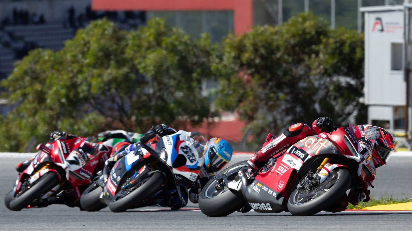 Nicolo Bulega leads Miguel Oliveira, Iker Lecuona, 2026 Portuguese WorldSBK. Credit: Gold and Goose.