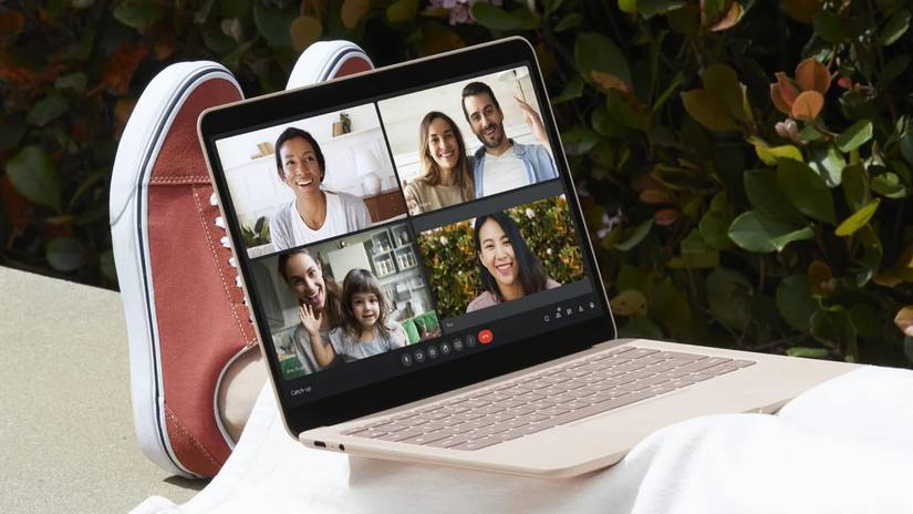 Photo of a person using Google Meet on their laptop.