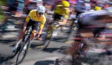 Riders of the men's WorldTour peloton race uphill during stage 2 of the 2026 Tour de Romandie