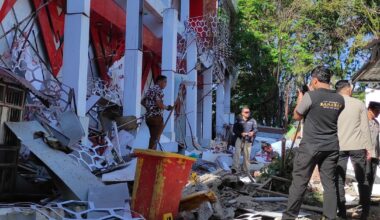 70-year-old woman killed, tsunami warnings downgraded