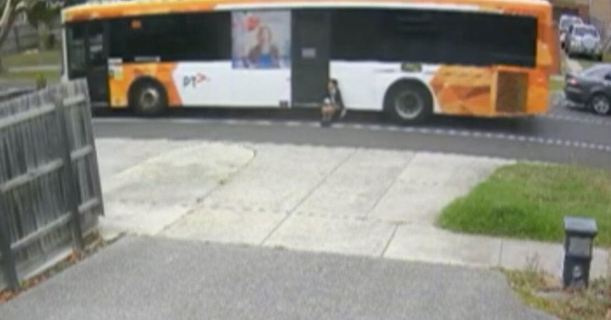 Melbourne schoolboy dragged down the road while trapped in bus doors