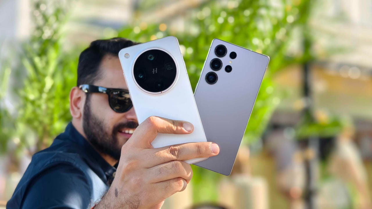 Prakhar Khanna holding the Oppo Find X8 Ultra and Samsung Galaxy S25 Ultra