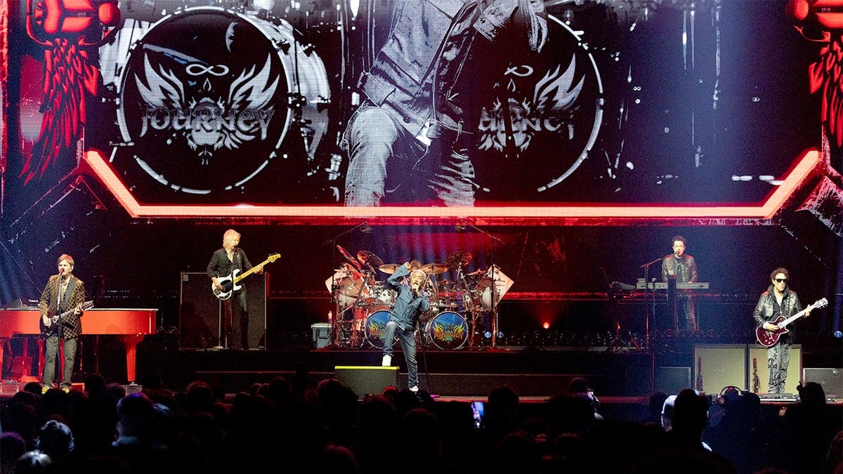 Jonathan Cain, Todd Jensen, Arnel Pineda, Jason Derlatka and Neal Schon of Journey