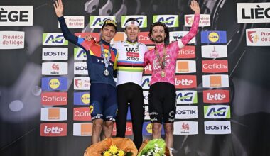 Giulio Ciccone, Tadej Pogacar and Ben Healy celebrate on the podium after the 2025 Liege-Bastogne-Liege