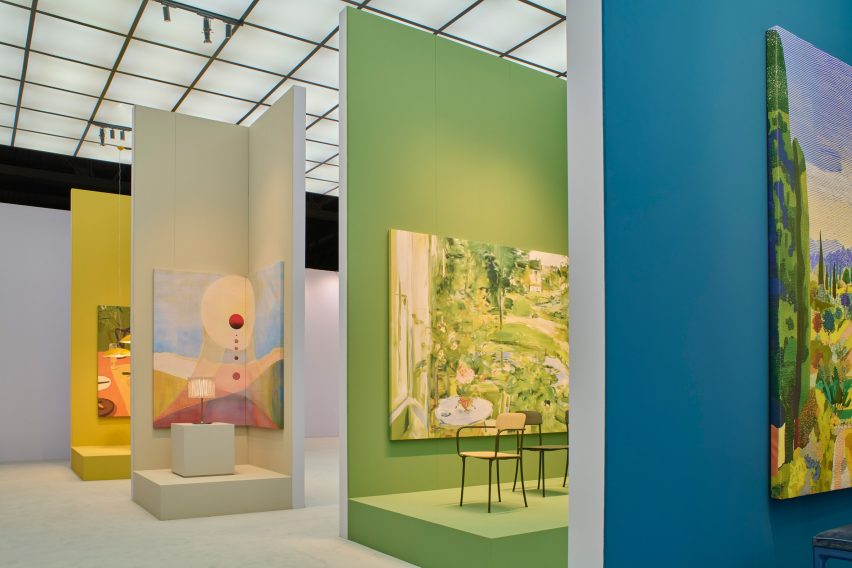 Wide shot of multiple displays at the Kartell stand at Salone del Mobile