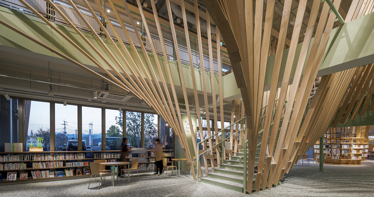 kengo kuma sculpts radiating hinoki louvres throughout chikujō library