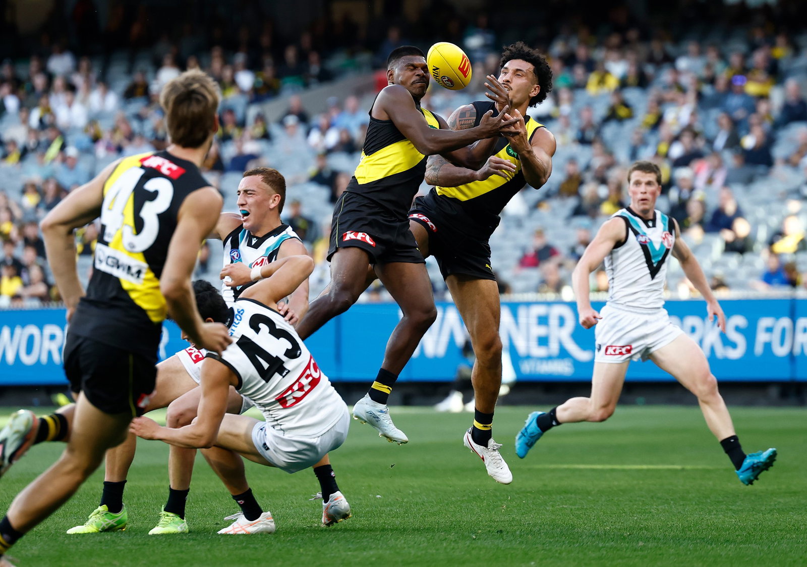 Maurice Rioli of the Tigers takes a spectacular mark over Logan Evans of the Power during the 2026 AFL Round 04 match between the Richmond Tigers and the Port Adelaide Power at the Melbourne Cricket Ground on April 4, 2026 in Melbourne, Australia.