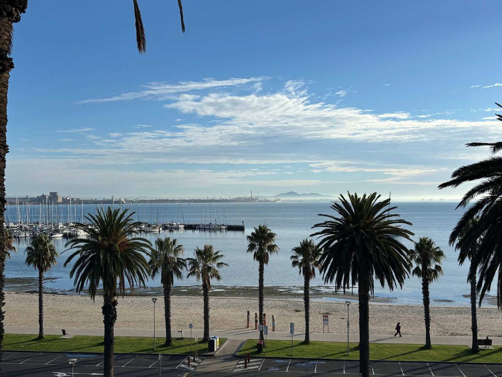 A shot of the beach in Geelong with the oil refinery all the way in the background without smoke.