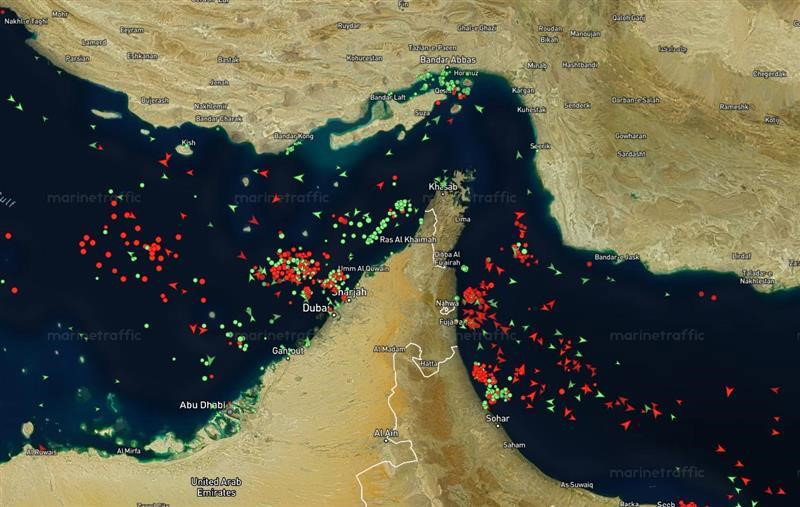 ships build up in the strait of hormuz on satelitte image
