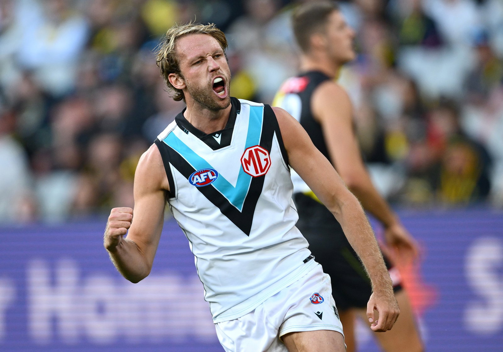 Jack Lukosius of the Power celebrates kicking a goal during the round four AFL match between Richmond Tigers and Port Adelaide Power at Melbourne Cricket Ground, on April 04, 2026, in Melbourne, Australia.