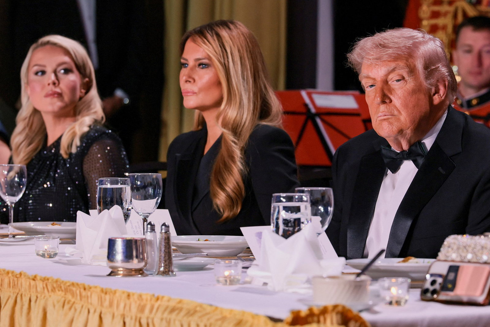 Trump and Melania sitting at the dinner table.