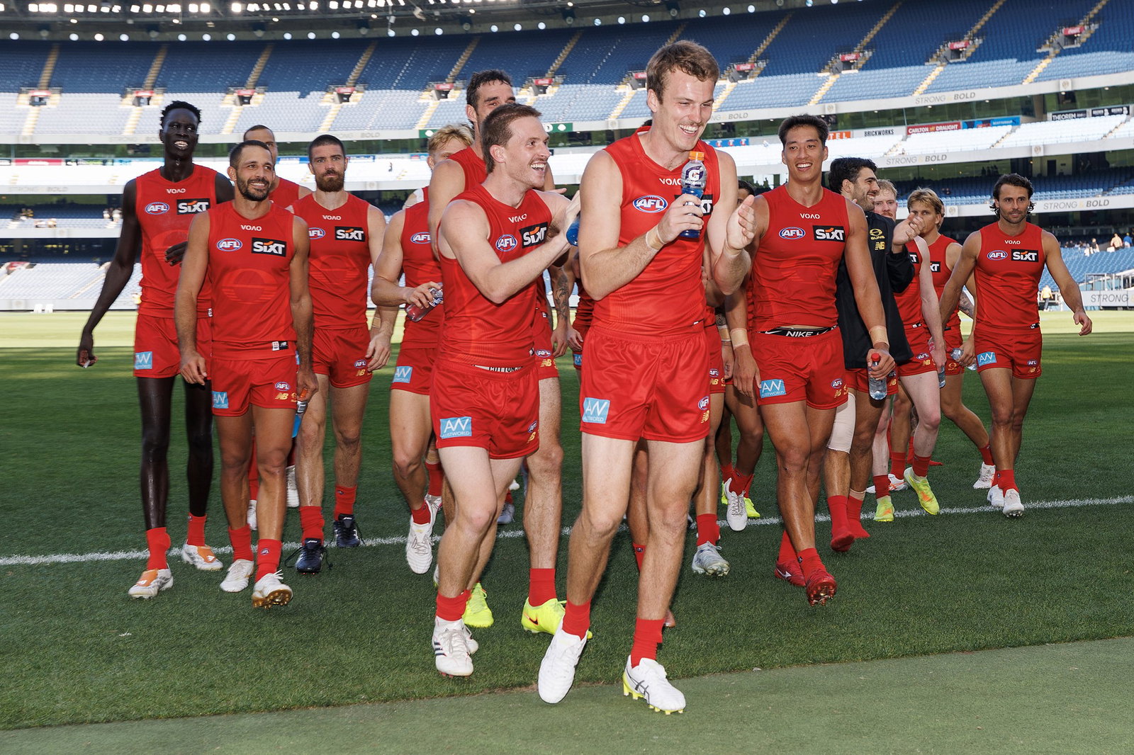 The Suns celebrate winning the round two AFL match between Richmond Tigers and Gold Coast Suns at Melbourne Cricket Ground, on March 21, 2026, in Melbourne, Australia.
