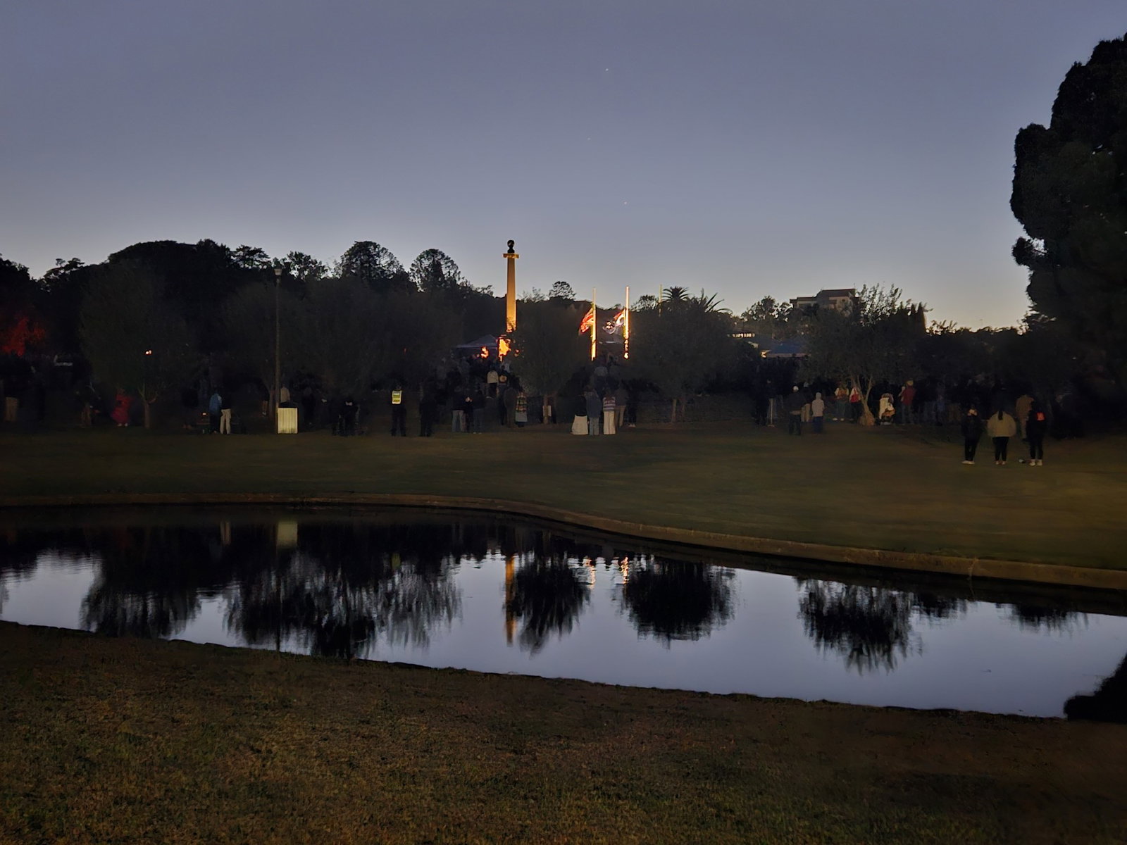 a crowd gathers at a dawn service in toowoomba