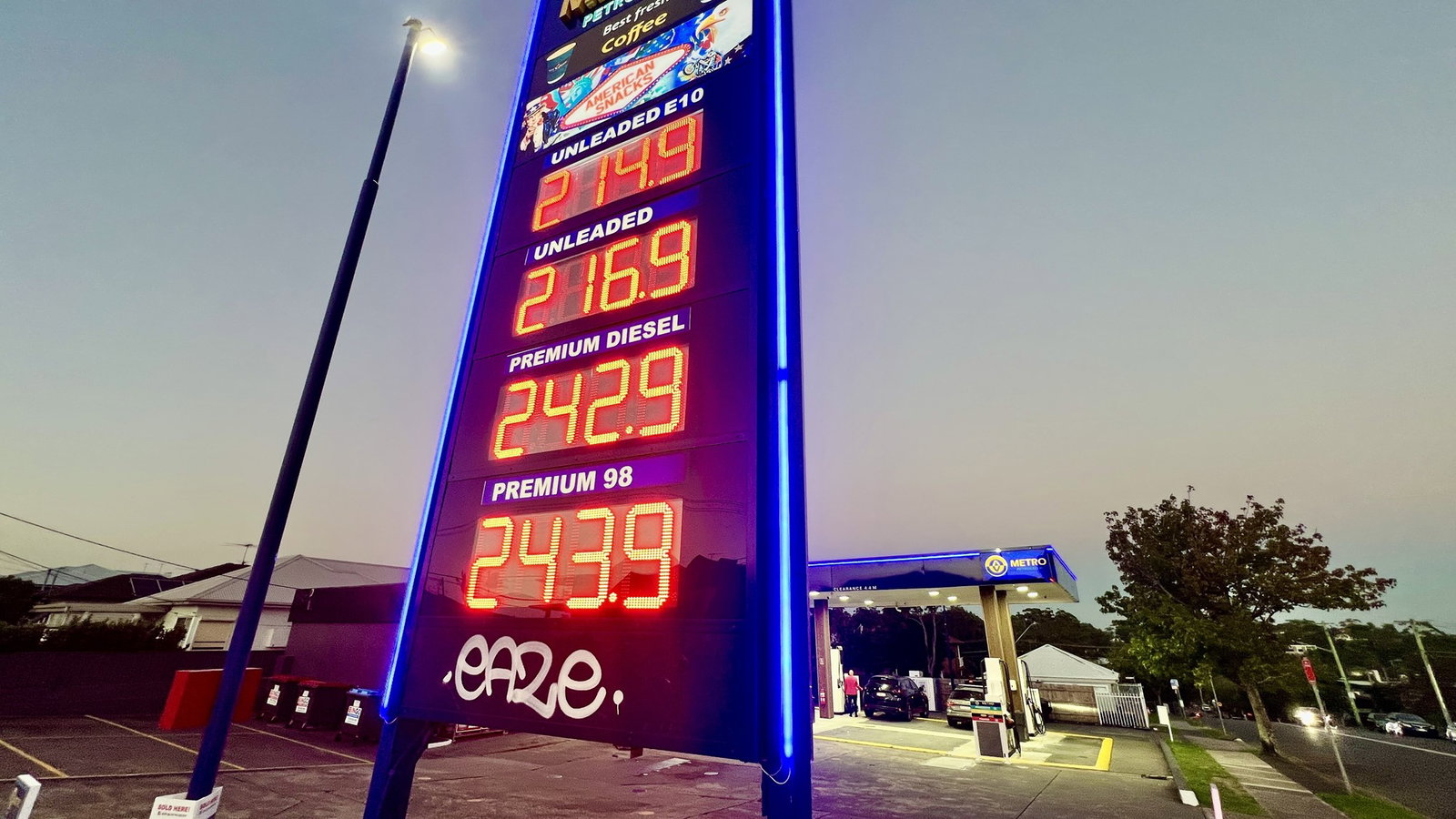 petrol sign showing prices of unleaded, diesel and premium 98 petrol