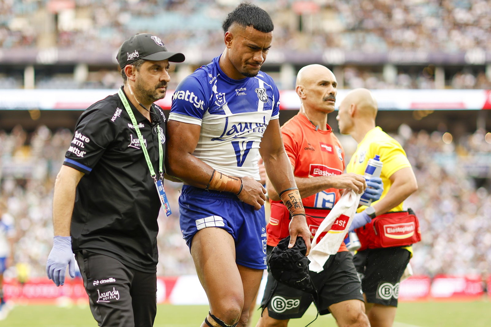 Stephen Crichton of the Bulldogs is assisted off the field with an injury during the NRL Round 5 match between the South Sydney Rabbitohs and the Canterbury-Bankstown Bulldogs