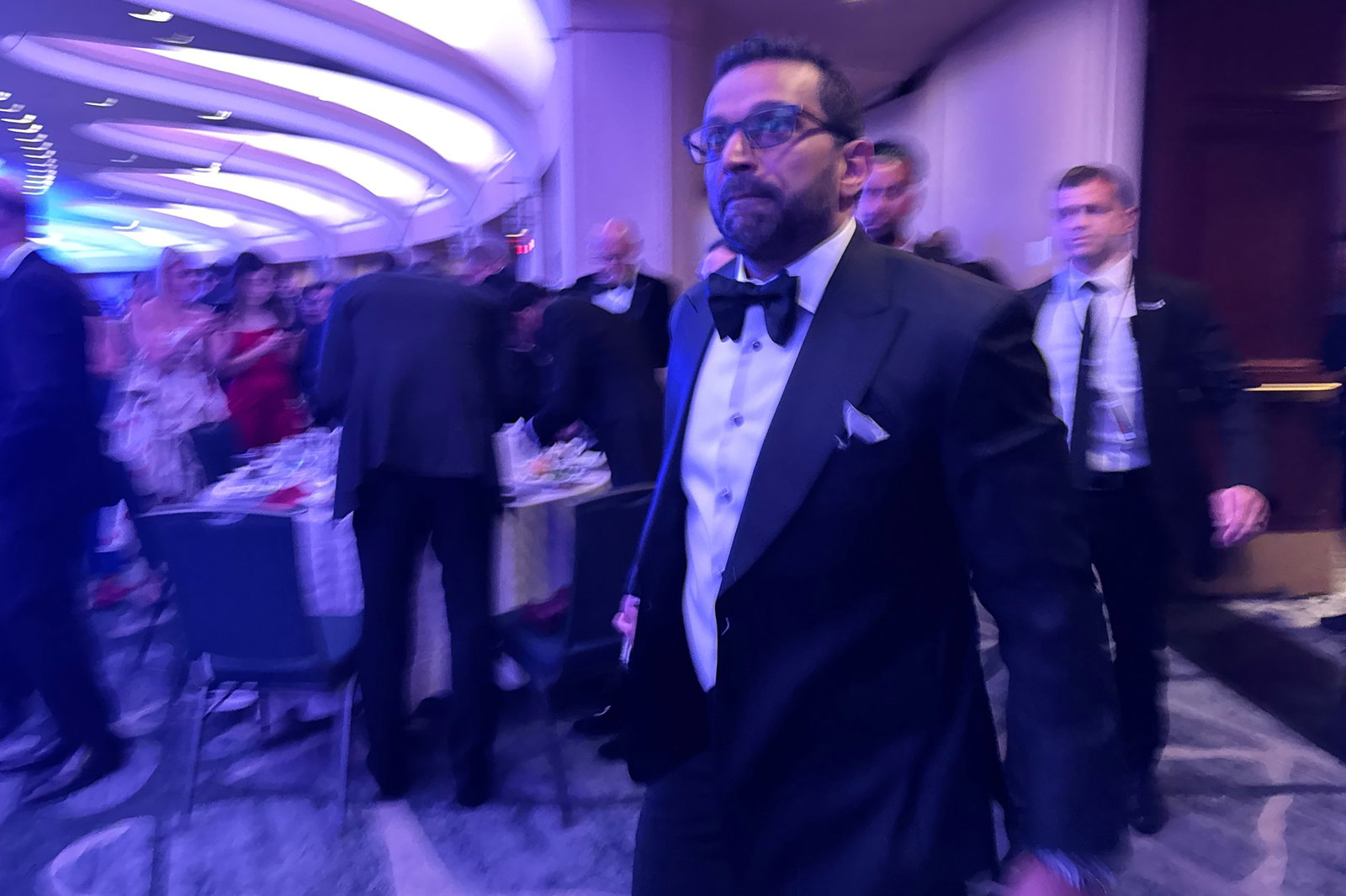 Kash Patel leaving the ballroom.