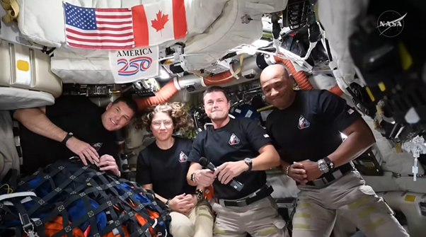 The four crew members inside the spaceship