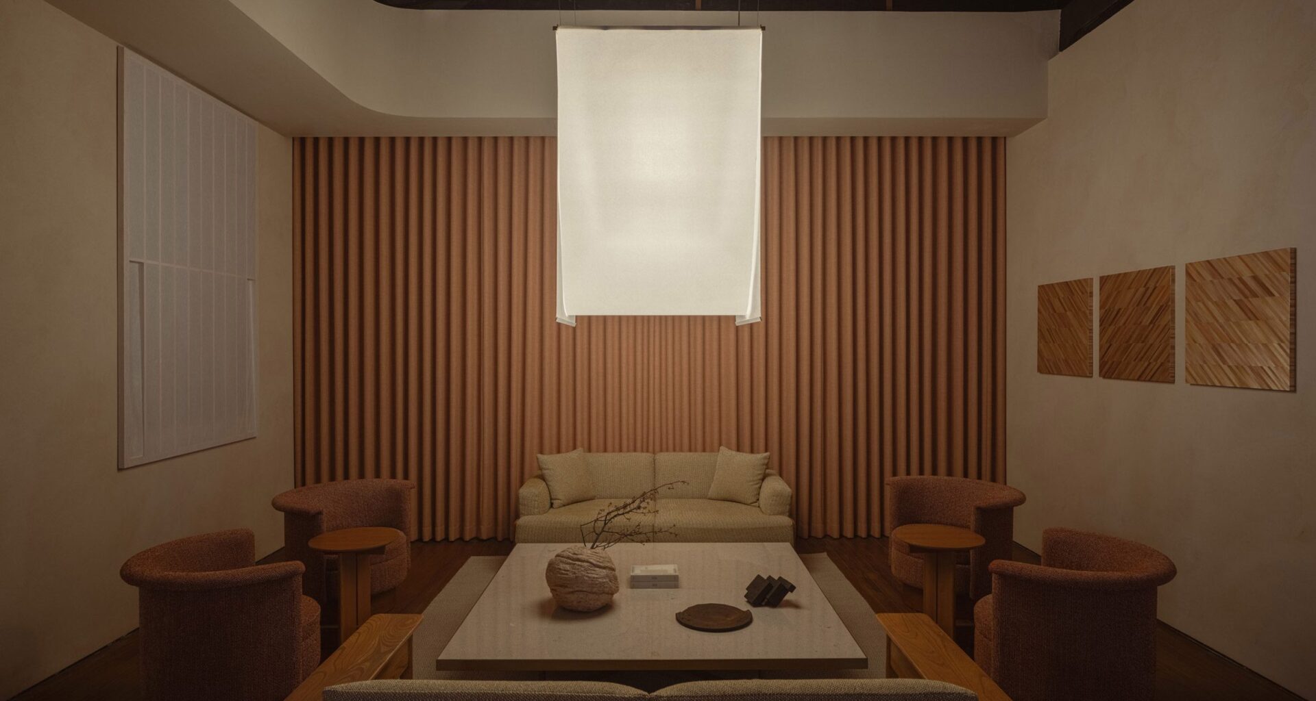 Washi-paper lamp above grey table