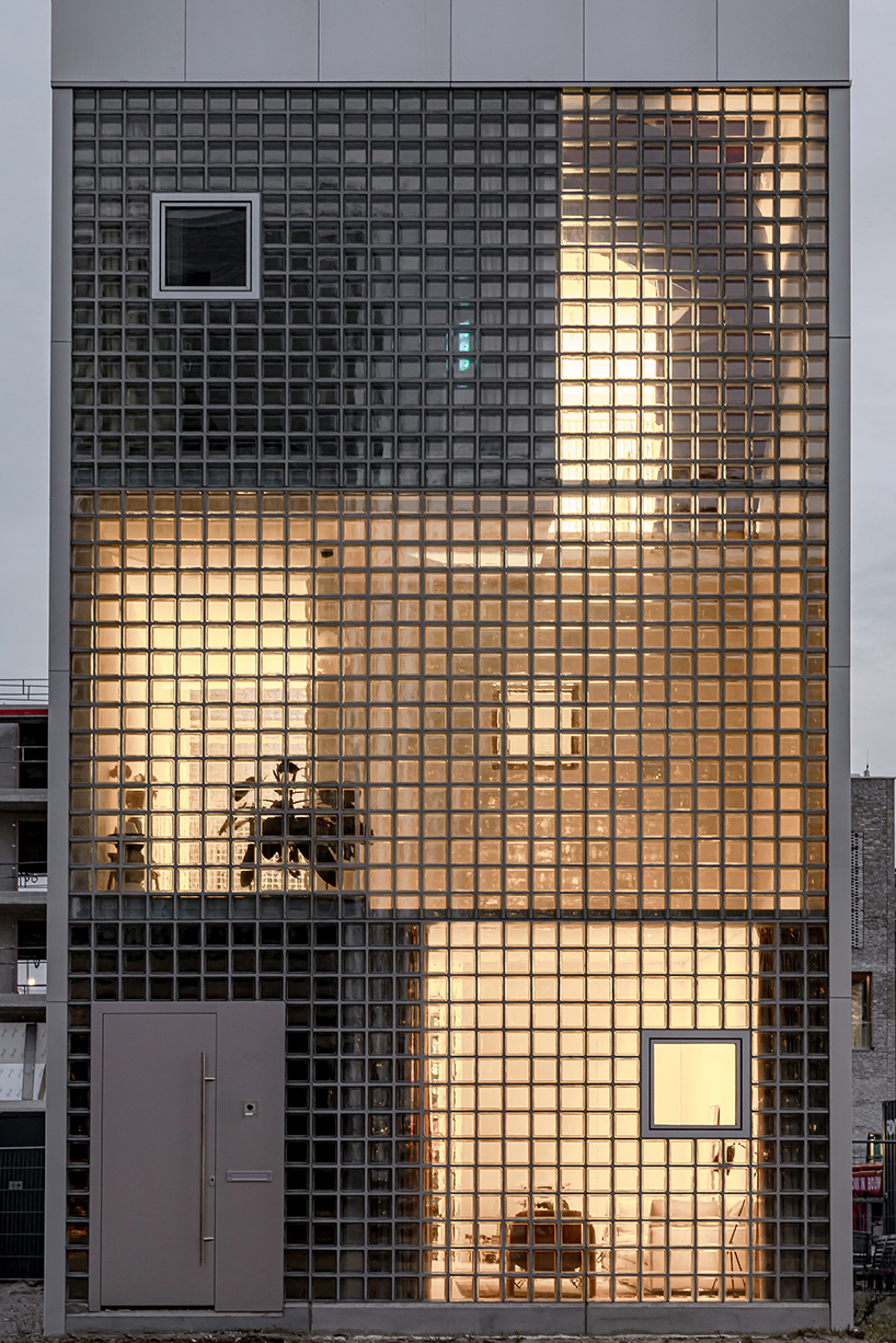 glass block facade wraps studioninedots’ playfully stacked box residence in amsterdam - 2