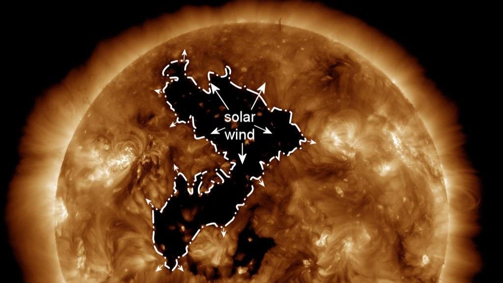 An illustrated photo showing a hole in the sun's corona.