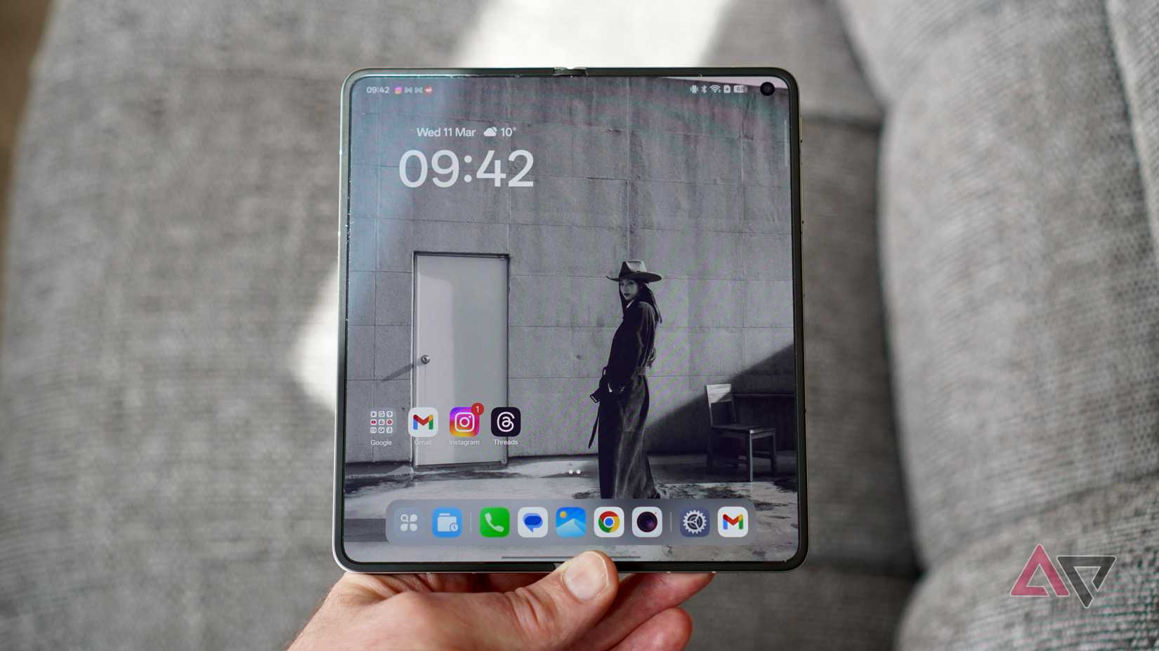 A person holding an open Oppo Find N6