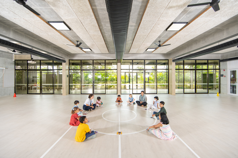 open courtyards and evolving green facades turn hyderabad school campus into living forest - 3