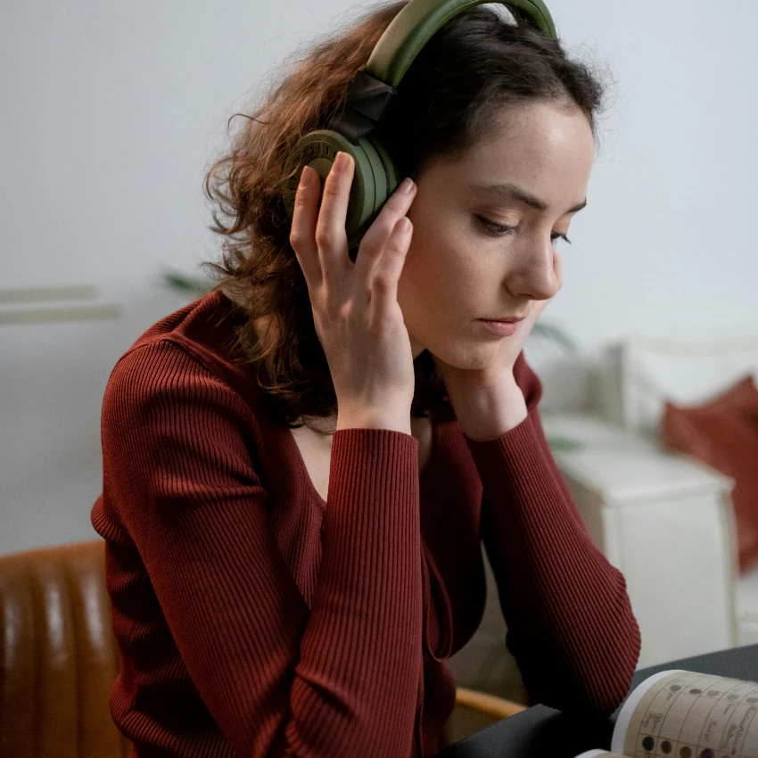 woman listening to metal music
