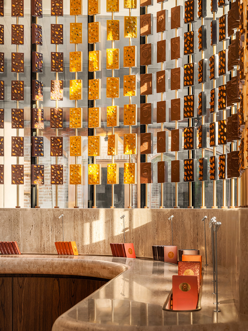 curved wood, rattan, and macaron displays frame a tropical french pâtisserie in singapore - 8