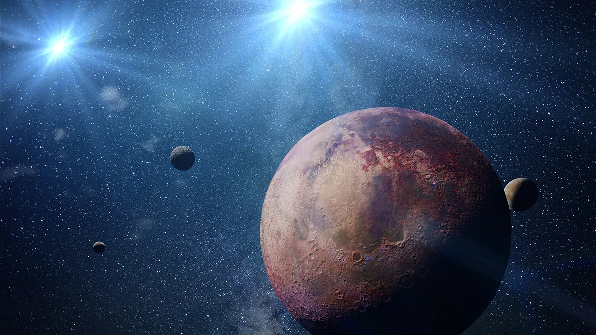 Artist's impression of a planet orbiting binary stars. Credit: dottedhippo / Getty Images