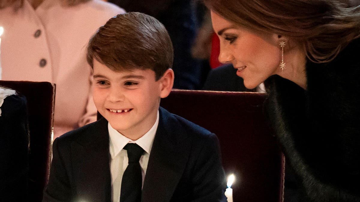 Prince Louis of Wales and Catherine, Princess of Wales, attending a carol service at Westminster Abbey