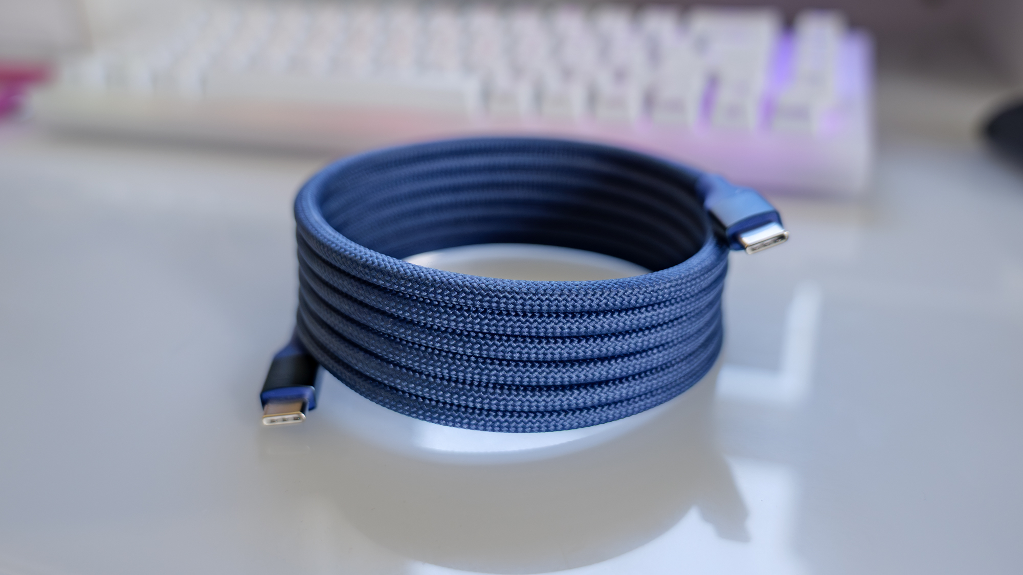 Scosche Statik MagStack USB-C cable on top of desk.