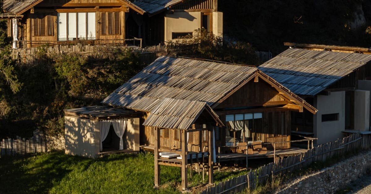 reclaimed timber forms a mountain cabin resort in china
