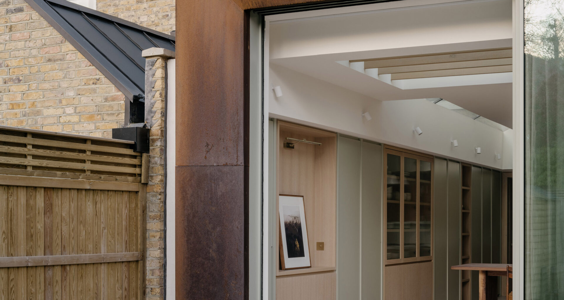 Will Gamble frames Ribbon House extension with weathered steel