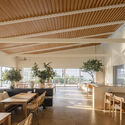 Sanya CR Land Haitang Bay Waterfront Center / Vari Architects - Interior Photography, Dining room, Wood, Table, Chair
