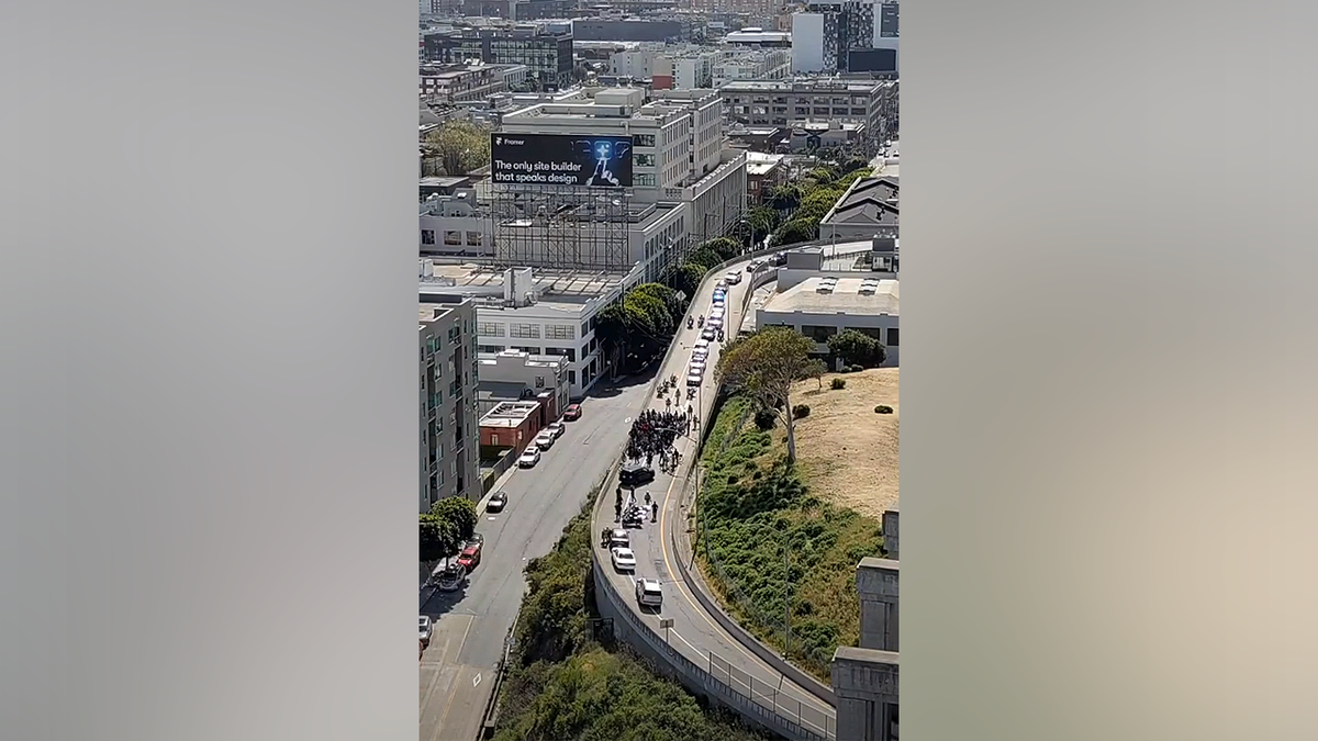 Aerial view of bike mob swarming ramp during Bay Bridge takeover attempt