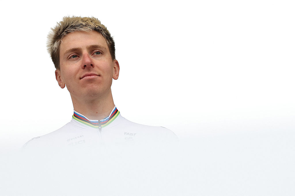 UAE Team Emirates XRG's Slovenian rider Tadej Pogacar stands on stage during the teams' presentations event on the eve of the 123rd edition of the Paris-Roubaix