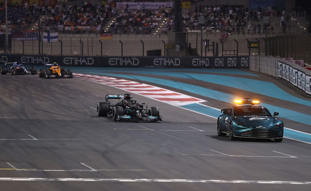 The FIA Safety Car leads Lewis Hamilton, Mercedes