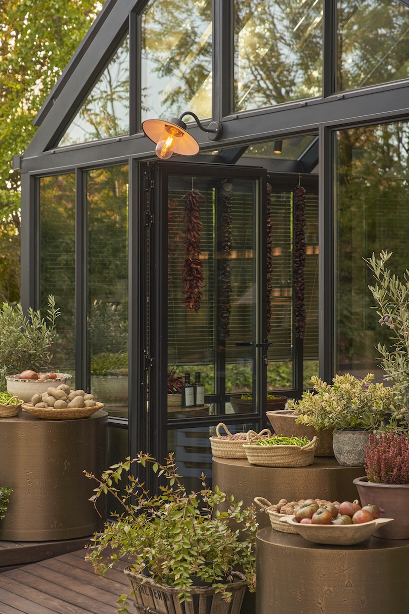 aluminum, timber, and bronze shape greenhouse retail space for culinary produce in madrid - 7