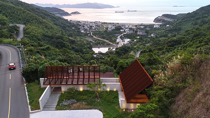 corten-clad twin pavilions frame shifting sea views along chinese coastal valley - 1