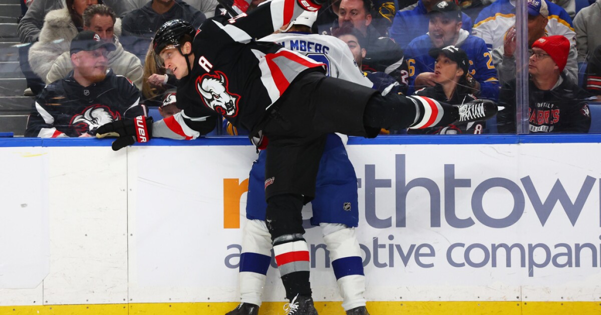 NHL investigates after Lightning's Holmberg hurts arm crashing into unlatched penalty box door