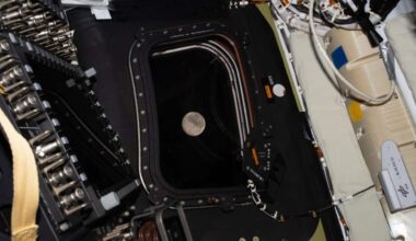 The moon viewed through the window of the Artemis II spacecraft (AAP)