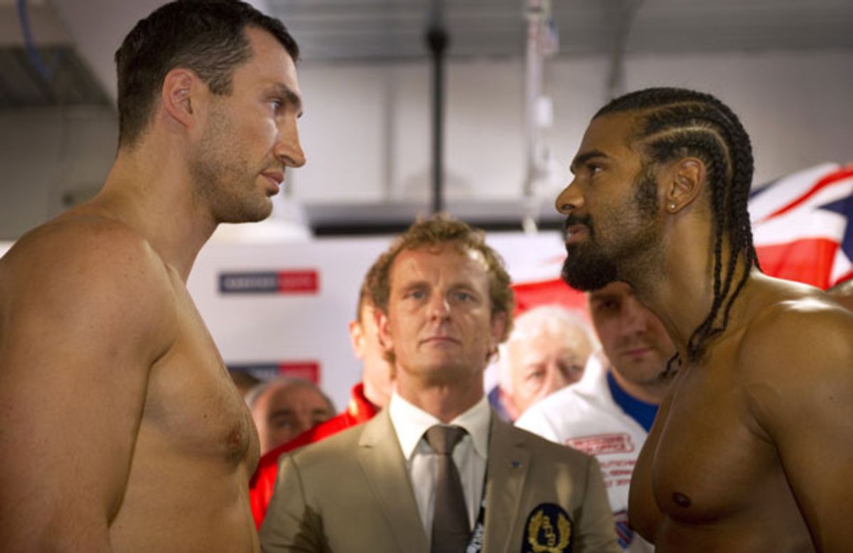 Wladimir Klitschko and David Haye face off after the weigh in on the eve of their heavyweight title bout (Pic: Getty Images)
