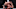 Islam Makhachev (blue gloves) fights Jack Della Maddalena (red gloves) in the welterweight championship bout during UFC 322 a