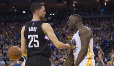 March 23, 2016; Oakland, CA, USA; Golden State Warriors forward Draymond Green (23) celebrates against Los Angeles Clippers guard Austin Rivers (25) during the third quarter at Oracle Arena. The Warriors defeated the Clippers 114-98. Mandatory Credit: Kyle Terada-Imagn Images